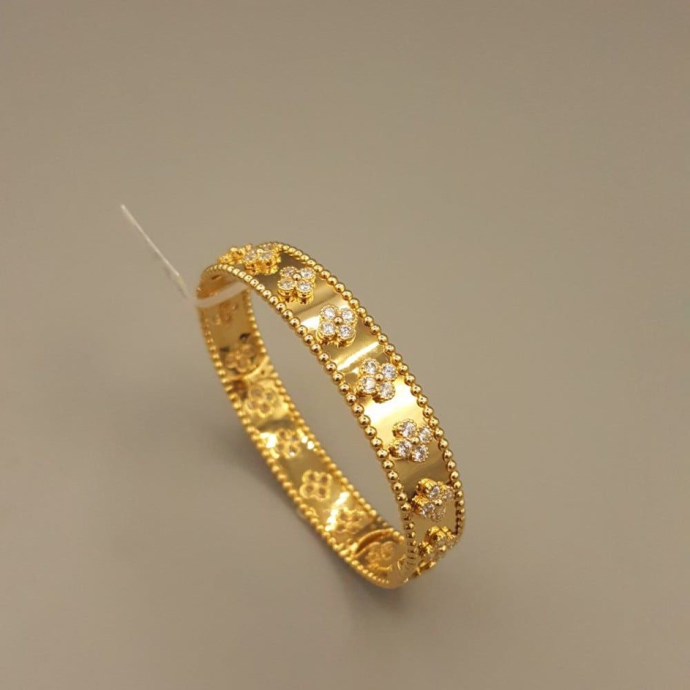 Van Cleef Bangle  and
Ring