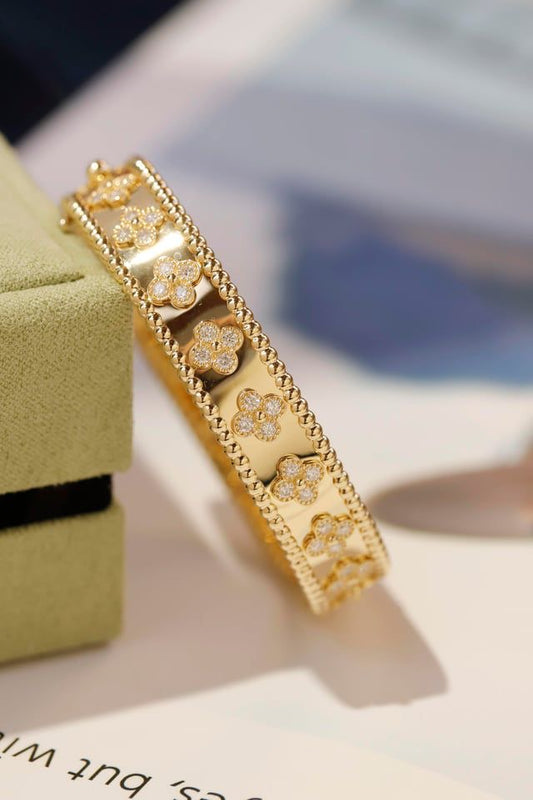 Van Cleef Bangle  and
Ring