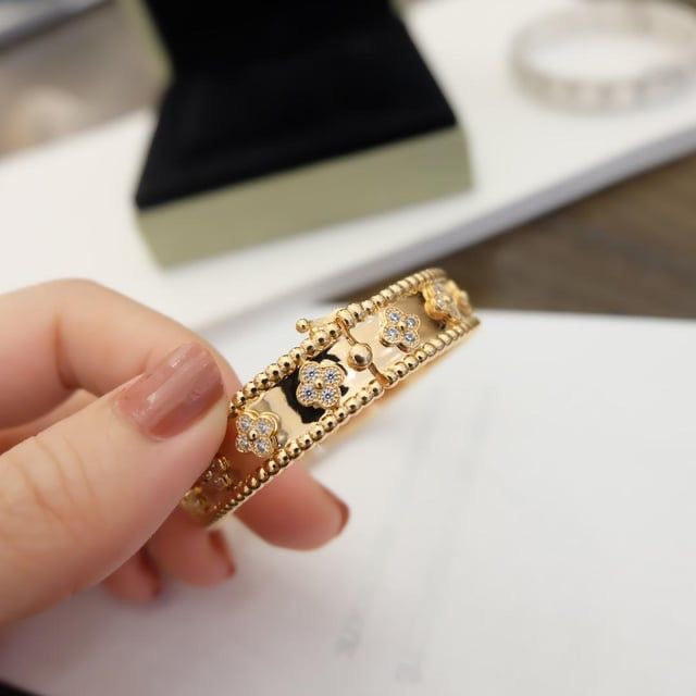 Van Cleef Bangle  and
Ring